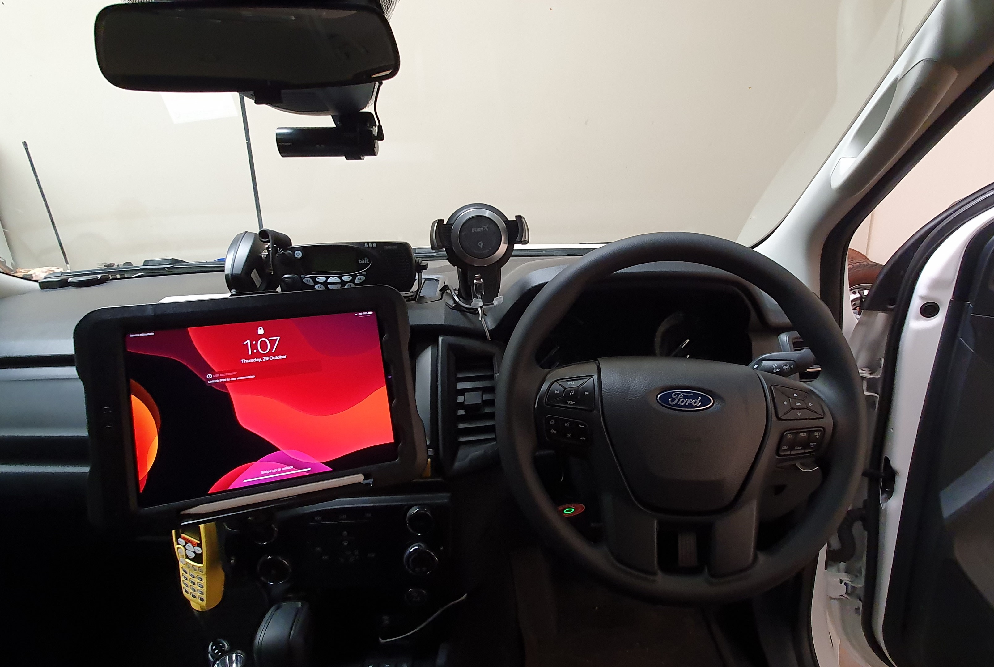 The Apple iPad installed in a dash mounting kit for a Ford Ranger