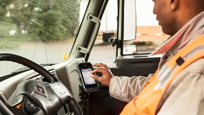 Delivery driver using Honeywell CT60 Rugged Smartphone