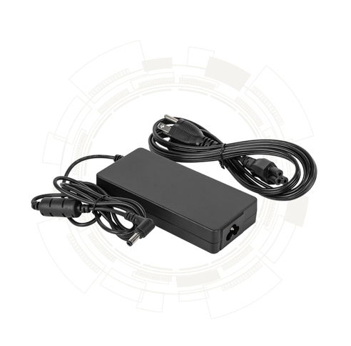 An AC Adapter plugged in and charging a rugged tablet