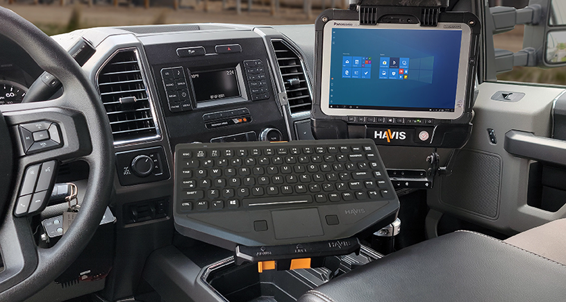 Rugged tablet in a vehicle mount inside a truck cabin