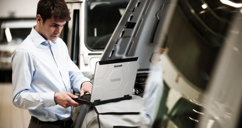 Worker using a rugged laptop which is more durable and adheres to MIL-STD-810G standards