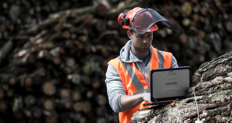 Field worker using a Panasonic toughbook 